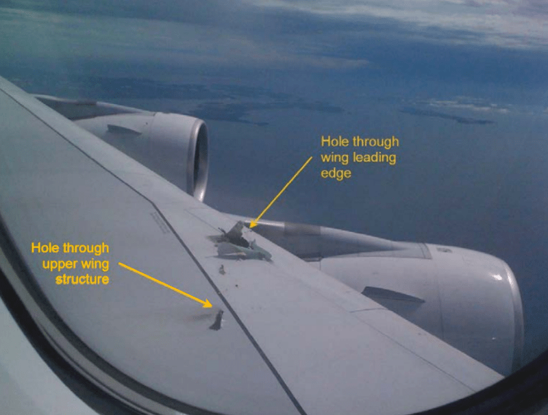 an airplane wing has a hole through the wing leading edge