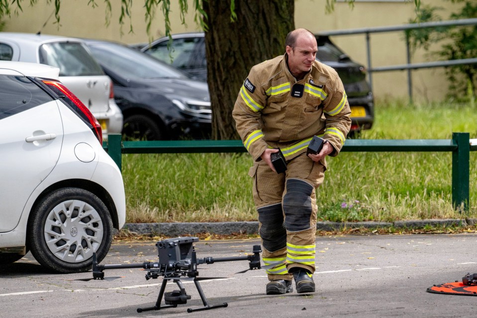 Police and fire service drone operators in action on Brigadier Hill, Enfield