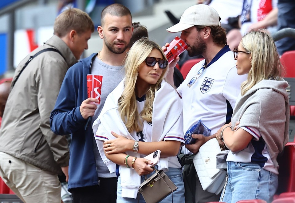 Luke Shaw's partner Anouska Santos, centre, ahead of the Switzerland clash