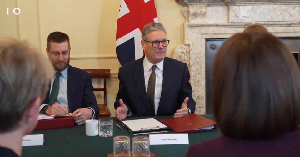 Sir Keir Starmer is seen charing his first Cabinet meeting