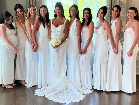 The bride had actually instructed her entire wedding party to wear white, in a break from the “norm”