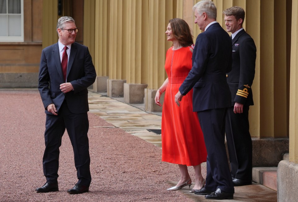 Keir Starmer and his wife Victoria leaving Buckingham Palace following an audience with King Charles III