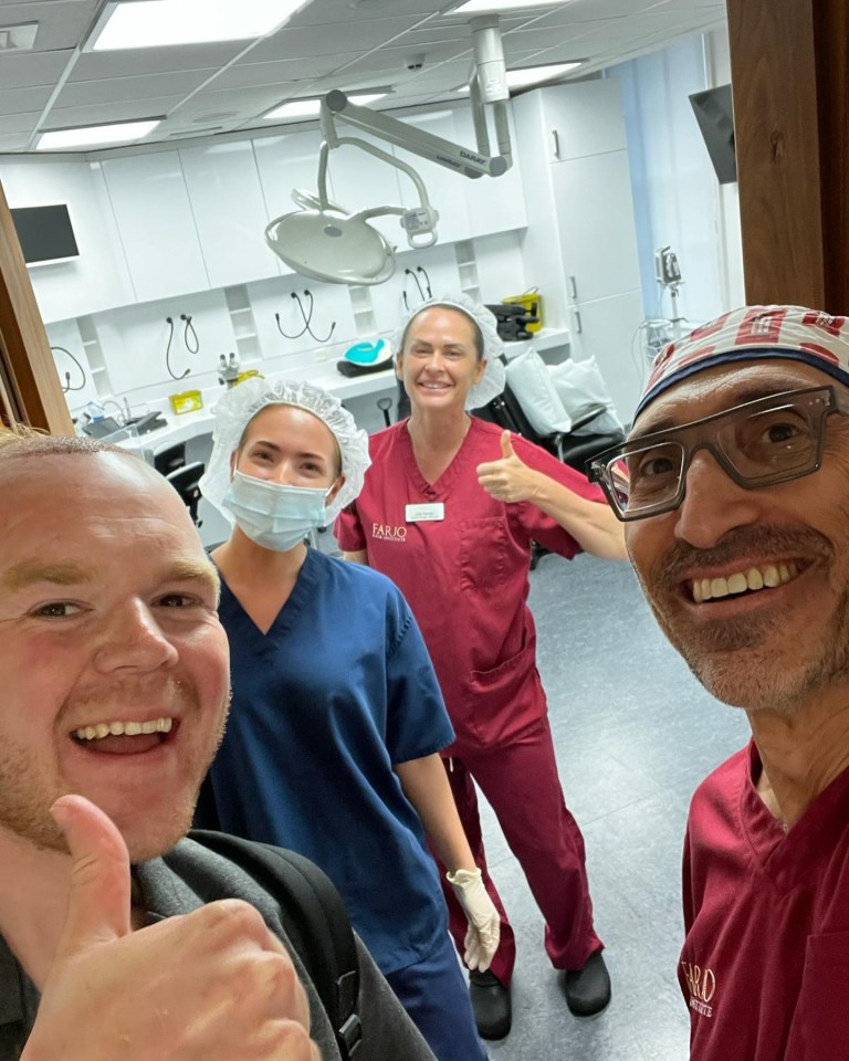 He posed with his surgeons before heading for the procedure