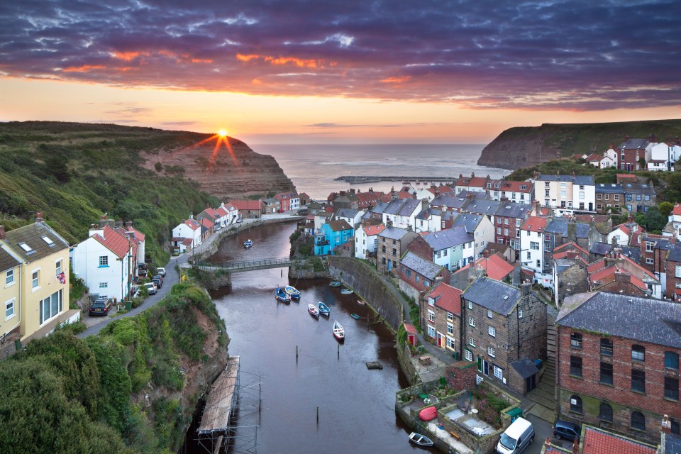 Staithes' rugged cliffs and traditional seaside cottages are the perfect backdrop for walking the Cleveland Way