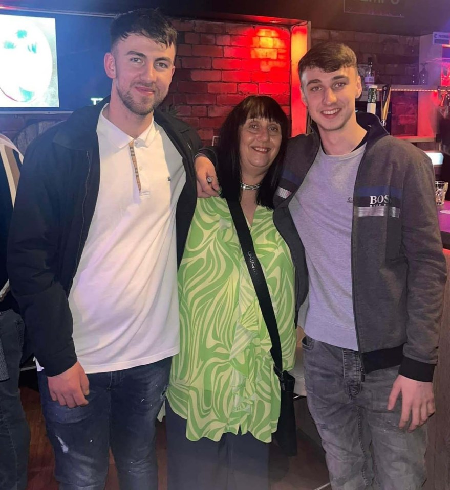 Jay (R) with his older brother Zak (L) and mum Debbie Duncan (C)