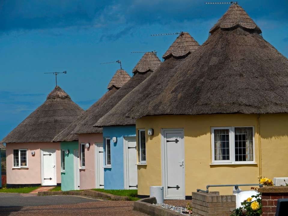 Holidaymakers can book to stay in colourful thatched cottages