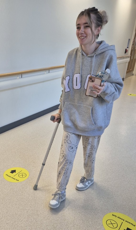 The 19-year-old on crutches in hospital, waiting for her X-ray results