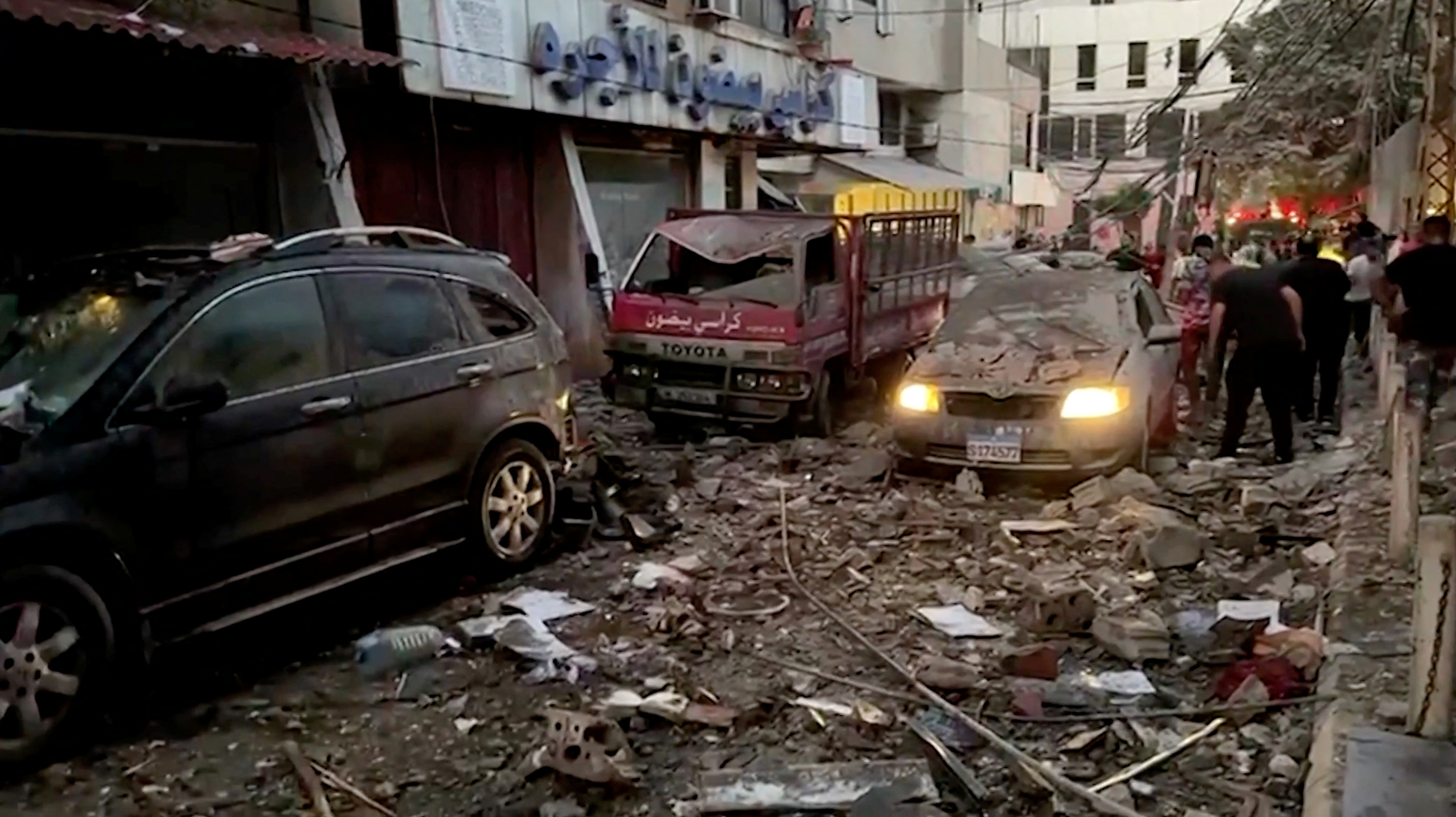 Cars covered in rubble after the 'targeted strike' by Israel on Lebanon