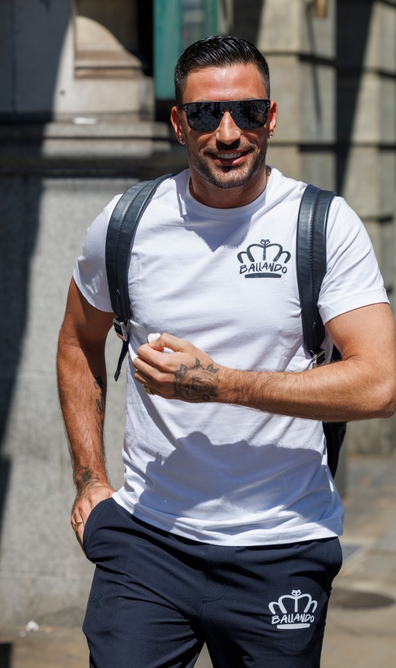 The BBC star donned a white top and matching logo trousers for his dance class