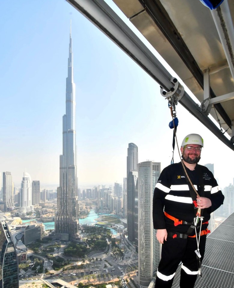 Paul Cunningham took a stroll around the top of a Dubai skyscaper with no safety barrier