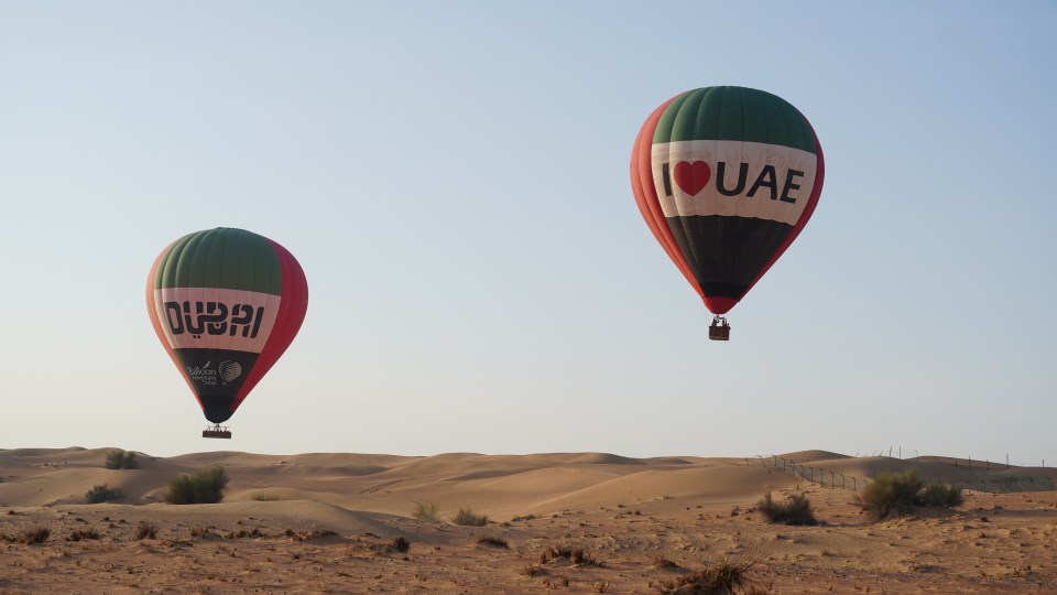 Enjoy a sunrise hot-air balloon tour over the desert