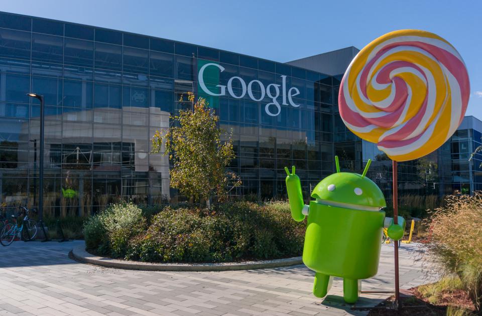 The Android Lollipop mascot in front of Google’s corporate headquarters