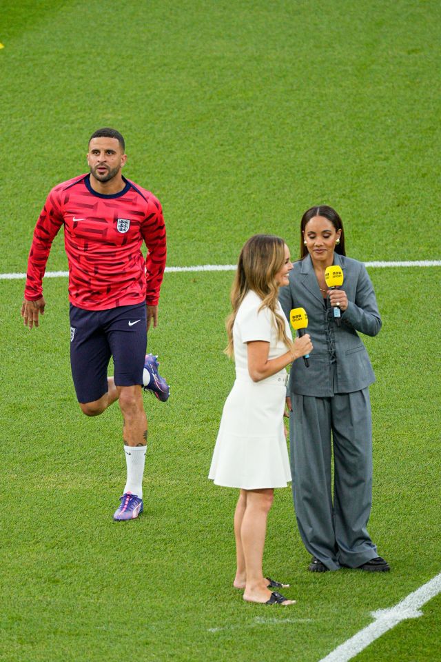 Kyle Walker runs past BBC's Kelly Somers and Alex Scott