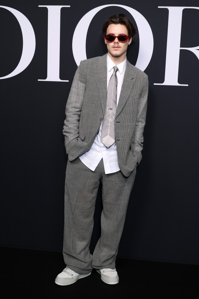 Cruz Beckham appeared at London Fashion Week in February in a striped suit and lime-green shirt