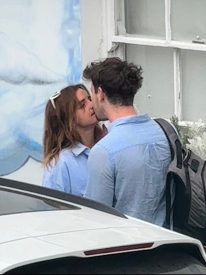 Emma was photographed snogging the brainbox on a date in the city earlier this month