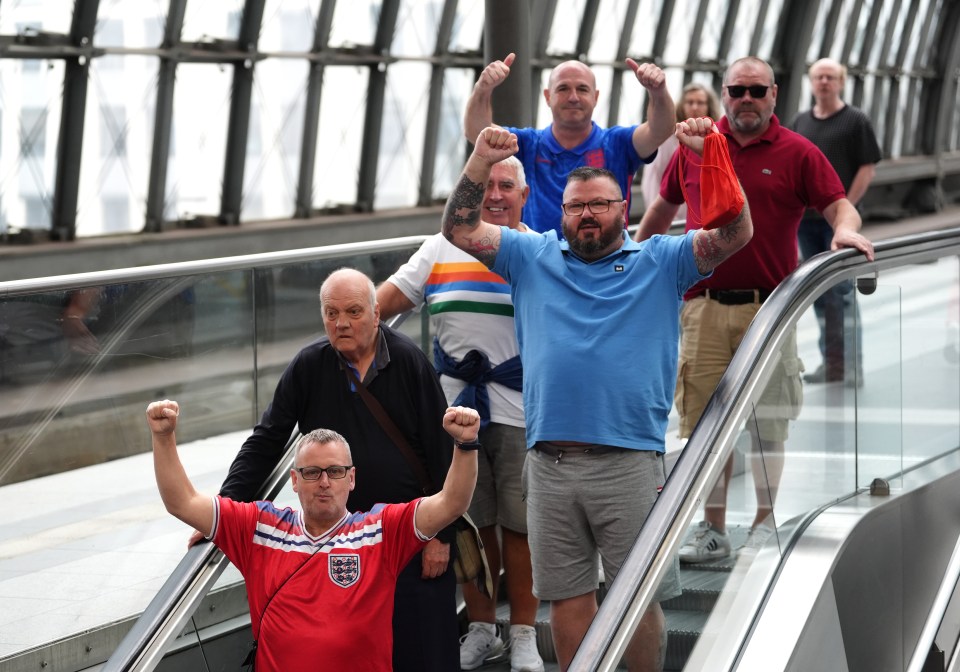 England fans arriving at Berlin Hauptbahnhof train station in Berlin