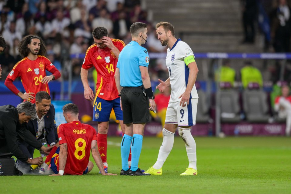 England captain Harry Kane speaks to ref Francois Letexier