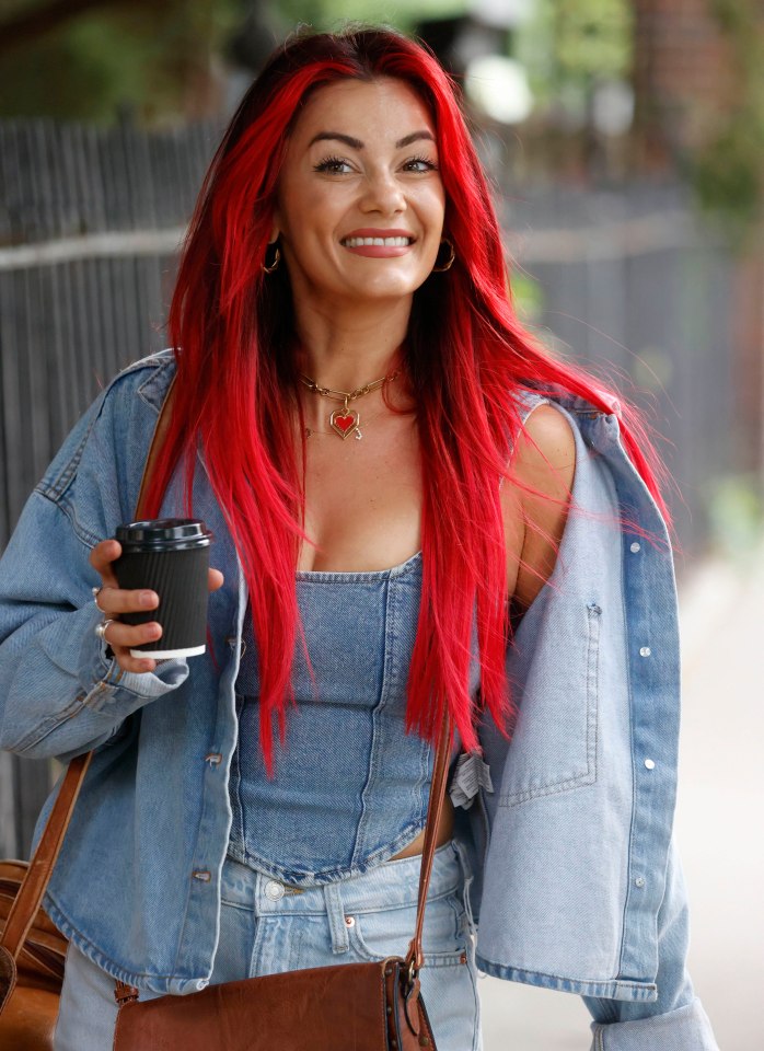 Aussie Dianne Buswell flashed a grin as she arrived in triple denim