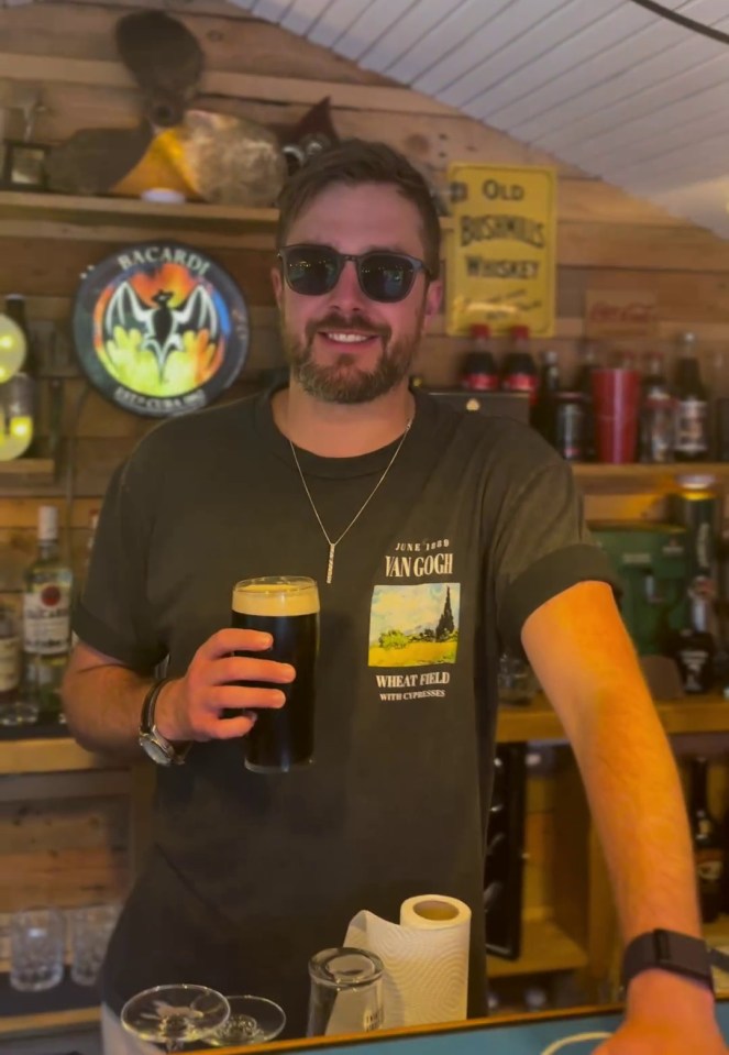 Iain Stirling poured himself a pint at his own home bar