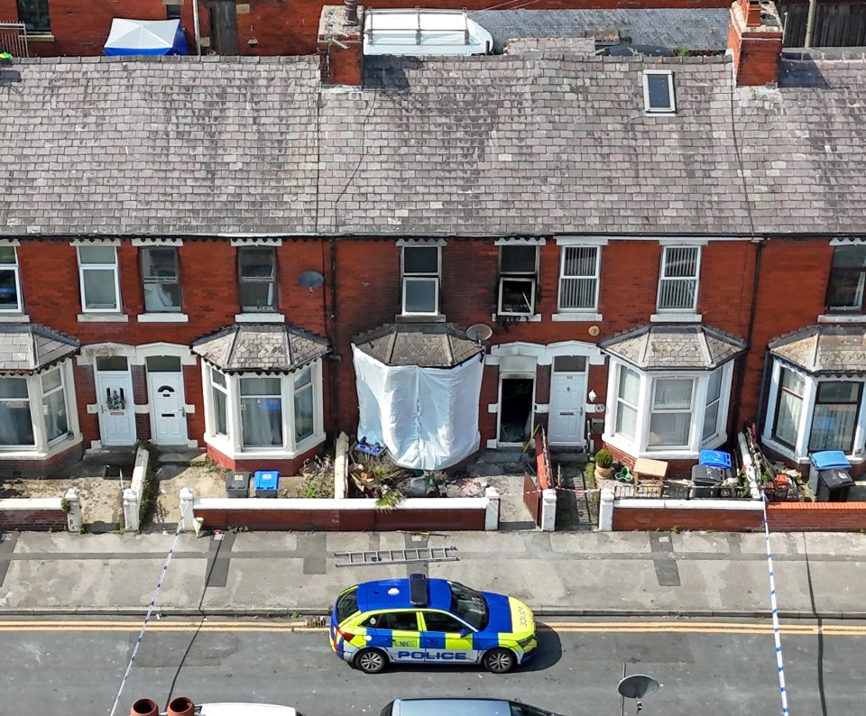 Two people have died in a horror house fire as two children are rushed to hospital