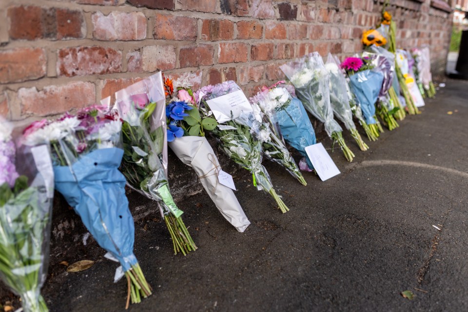 Tributes left by the police cordon