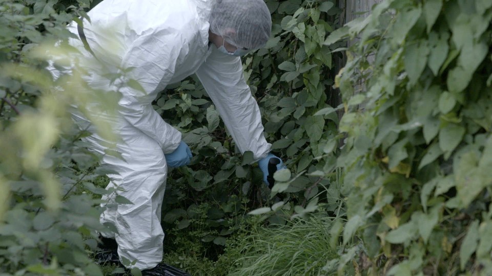 Forensic officers discovering the 18-inch machete used in Kyron's murder