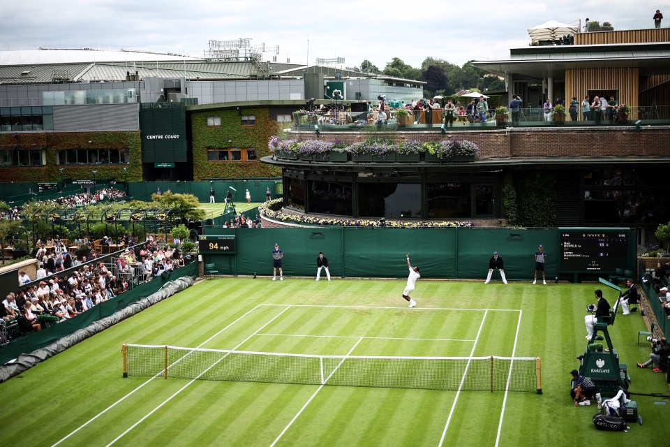 a tennis court with a sign that says centre court