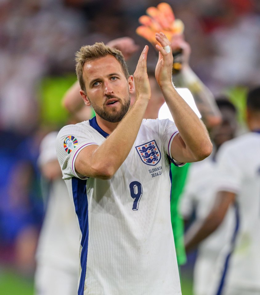 Harry Kane applauds after England's comeback win against Slovakia