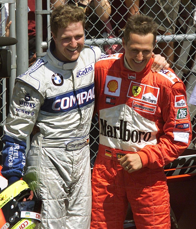 Ralf Schumacher, then of Williams, is hugged by his brother Michael after winning the Canadian Grand Prix in 2001