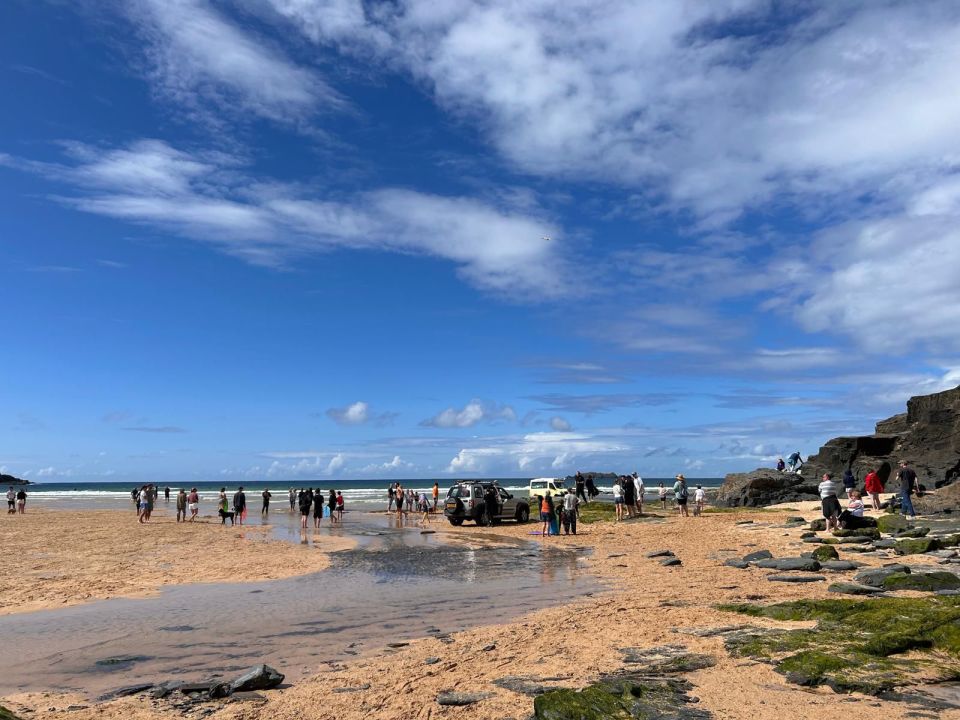 A crowd of beachgoers attempted to rescue the vehicle which was on Harlyn Bay beach