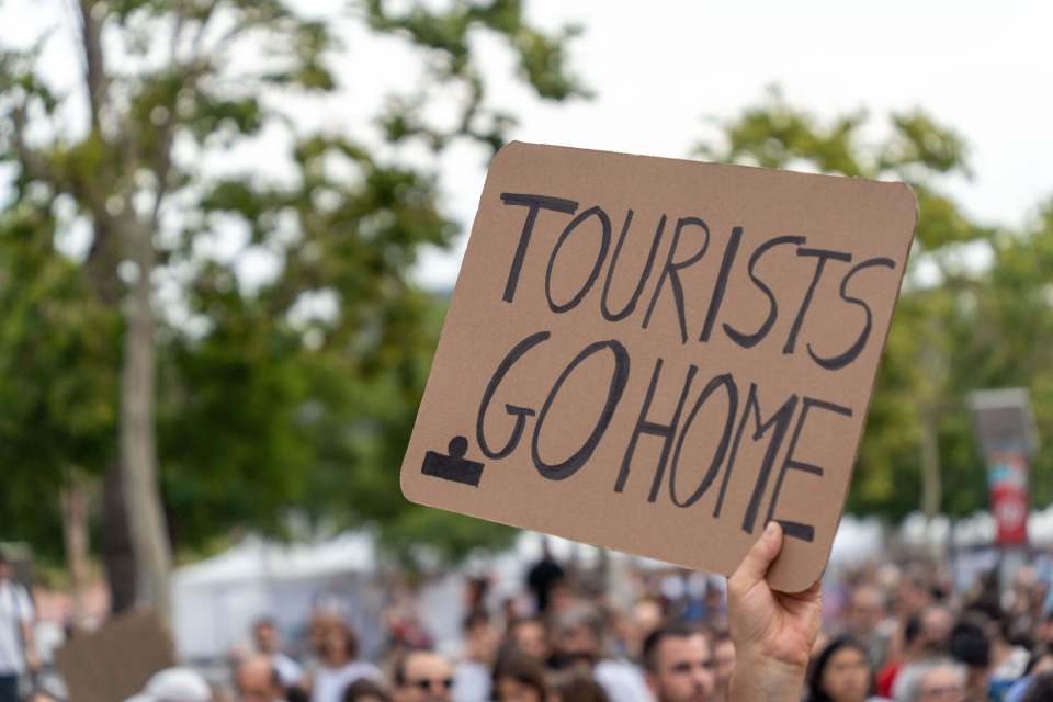 Mandatory Credit: Photo by Eric Renom/LaPresse/REX/Shutterstock (14575069p) Thousands of people are protesting in downtown Barcelona against the city's tourist overcrowding, demanding that measures be taken to stop a situation they consider unsustainable." Miles de personas se manifiestan por el centro de Barcelona en contra de la masificaci¿n tur¿stica de la ciudad, y reclamando que se ponga freno a una situaci¿n que consideran insostenible. News politics -Barcelona, Spain Saturday, July 6 2024 Protest Against Tourism in Barcelona, Spain - 06 Jul 2024