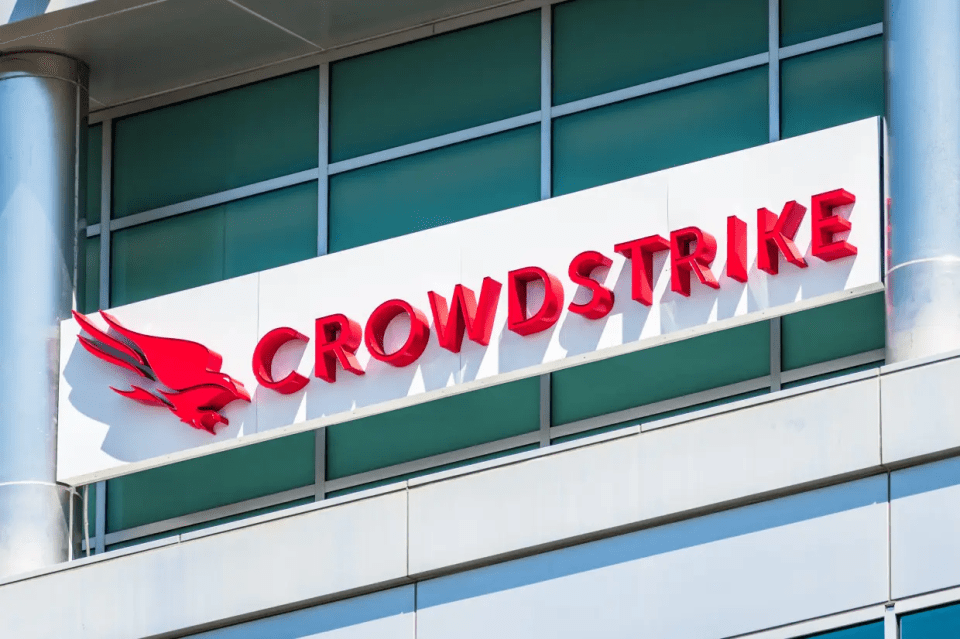 a sign on the side of a building that says crowdstrike