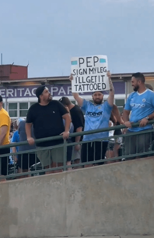 A City fan caught Pep's attention with a sign