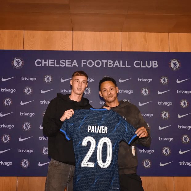 Cole Palmer with his dad Jermaine after signing for Chelsea