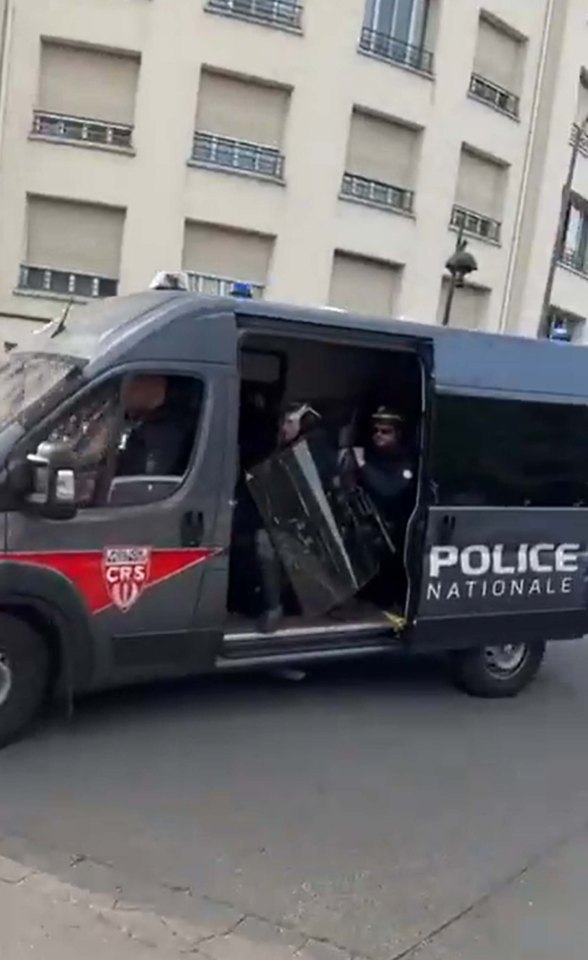 Cops with riot gear were spotted in vans behind the Israeli team