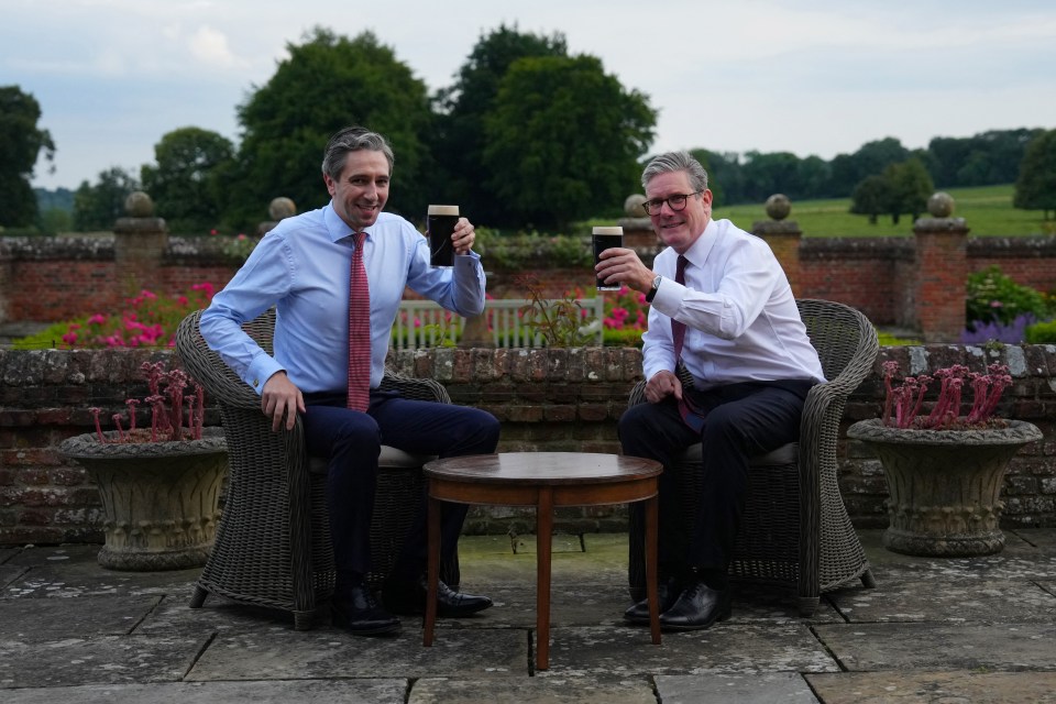 Ireland’s Simon Harris and PM Keir Starmer drink pints of Guinness at Chequers