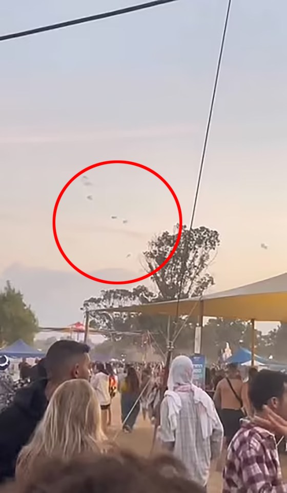 Israeli festival goers were captured dancing hapily just moments before Hamas soldiers descended from the sky and began their terror