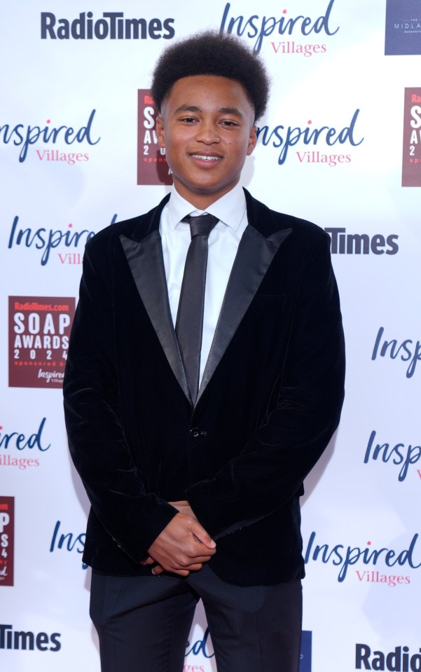 Jaden Ladega wore a smart black suit on the night