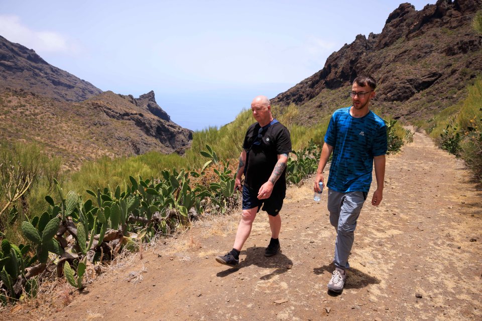 Jay Slater’s father Warren Slater (left) and his brother Zak at the Masca Village Ravine the area where the teenager was last seen