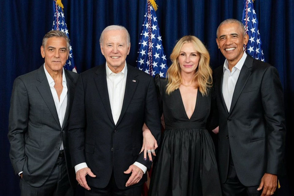 Clooney standing alongside Biden, Julia Roberts and Obama at Democratic Party fundraiser