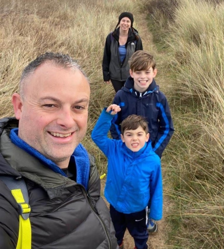 The mum with her husband Nick and two children before being diagnosed with hyperacusis