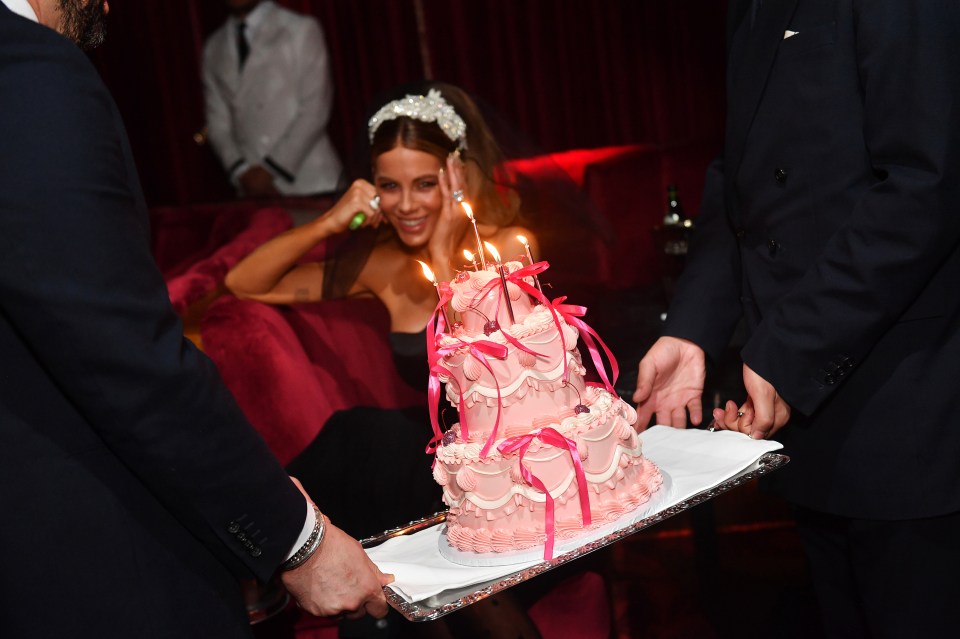 Kate celebrated with a pink three tier birthday cake