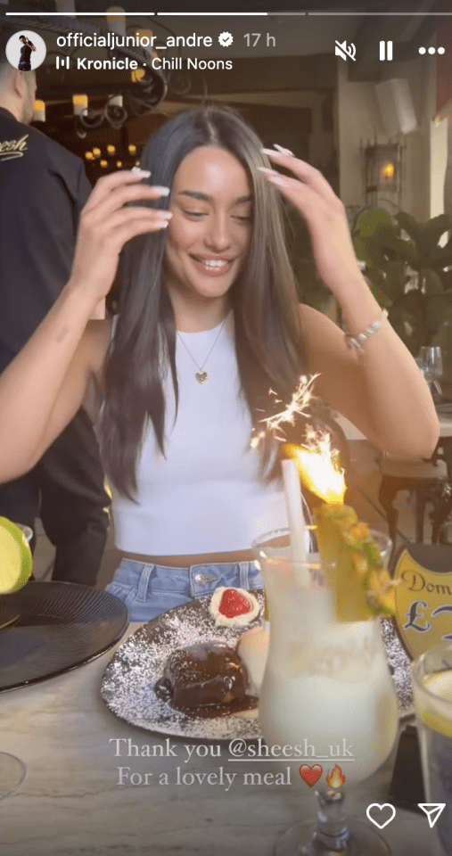 The brunette kept things classy in a white top and jeans