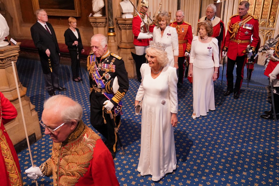 King Charles III and Queen Camilla arrive for the State Opening of Parliament in the House of Lords