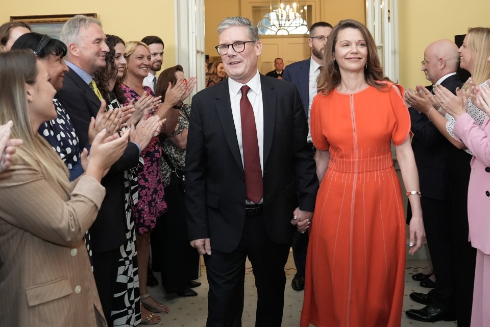 The Starmers enter their official London residence at 10 Downing Street for the first time