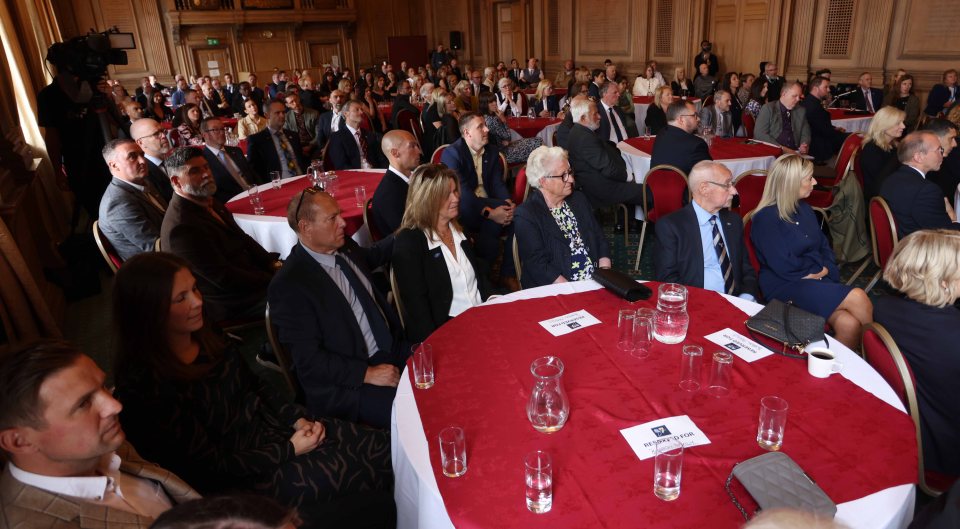 Loved ones gathered to pay their respects at Leeds Civic Hall today