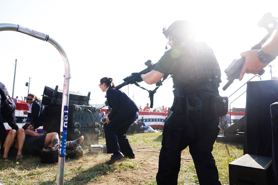 Cops react after the shooting on Saturday