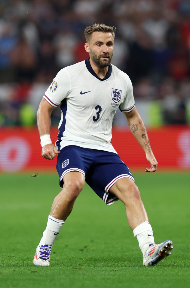 a soccer player with the number 3 on his jersey