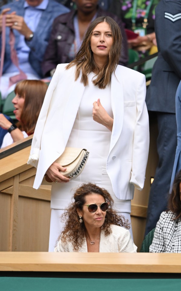 Sharapova was among a host of former champions in the Centre Court crowd