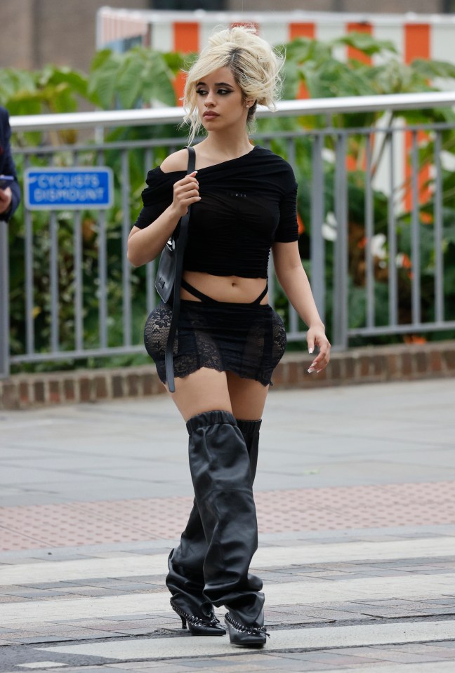 Camila Cabello stunned in a lace miniskirt and thigh-high boots on a day out in London